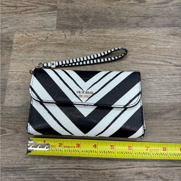 Victoria's Secret Handbags - Victoria’s Secret Black and White Clutch